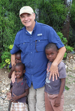 Missionary Ken Taylor and Haitian children