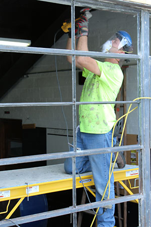 Worker restore Tyson building