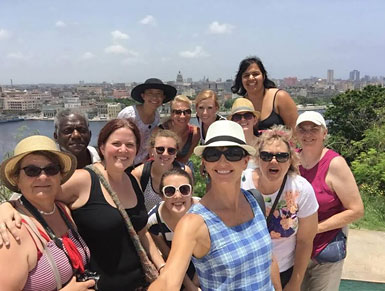 Leah Crowe and teachers in Cuba