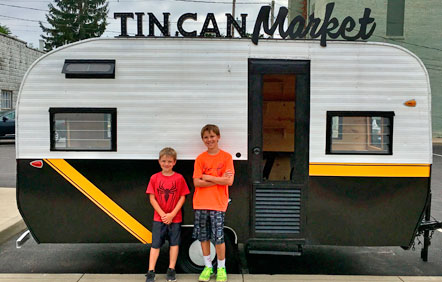 Ty and Beckham Comer and Tin Can Market